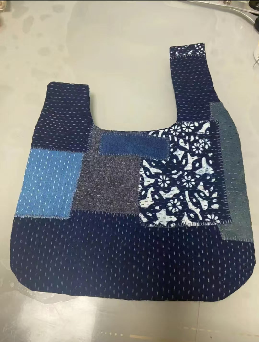 Sashiko Indigo Plant-Dyed Patchwork Knot Bag.