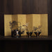 Washi shoji folding screen gold leaf panel behind Rin Essense black lacquer teapot and two matching tea cups