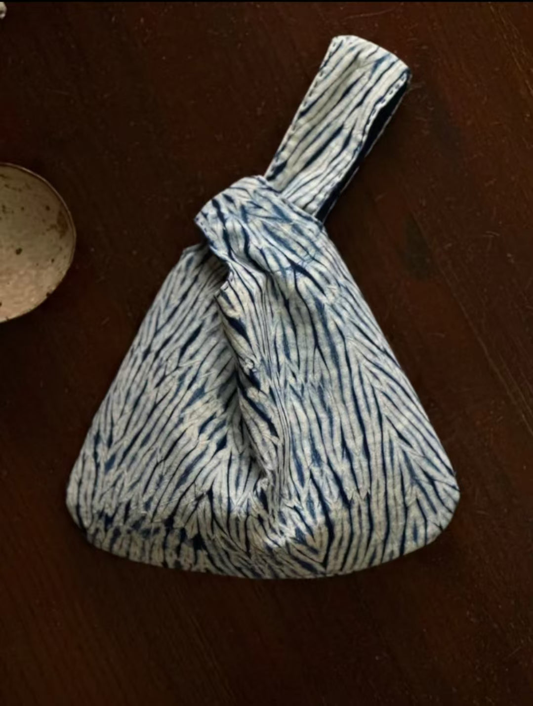 Rin Essense Indigo Shibori knot bag small hand tied tote with blue and white wavy pattern