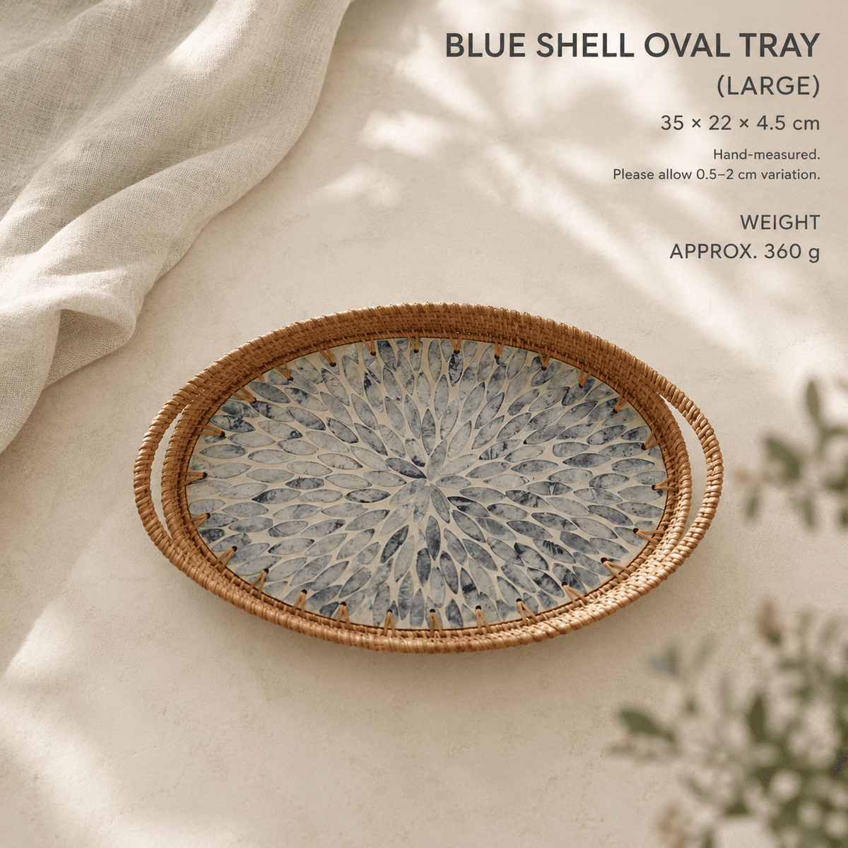 Blue shell oval tray with mother of pearl nacre inlay and woven rattan rim by RIN ESSENCE