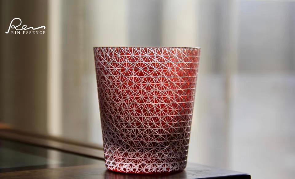 Rin Essense red sake cup featuring intricate Edo Kiriko style drinkware pattern on glass