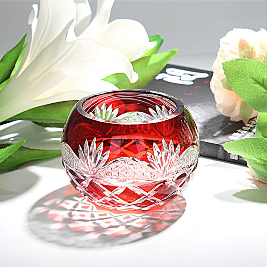 Japanese Edo Kiriko Glass Candle Holder – Round Ball Design in red with intricate cut patterns on white surface