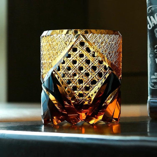 Satsuma Kiriko whiskey glass amber cut crystal tumbler with intricate geometric patterns for elegant whiskey serving