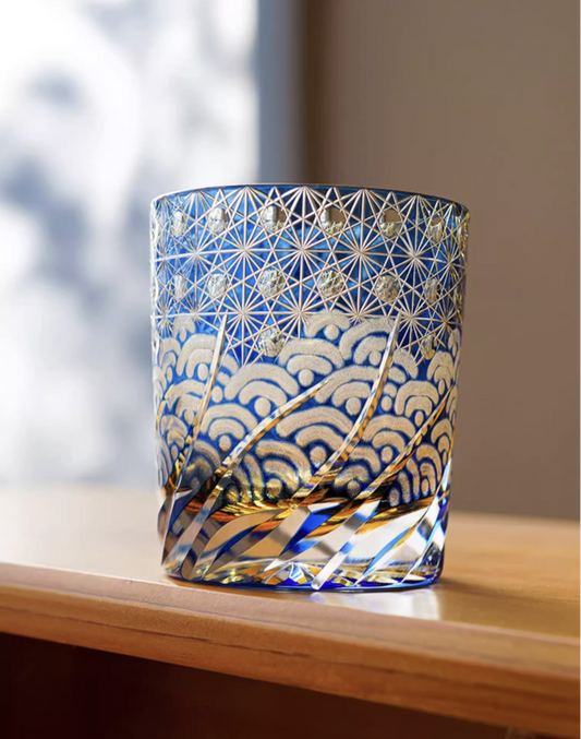 Edo Kiriko whisky glass blue cut crystal tumbler with gold seigaiha wave and asanoha star pattern on wood