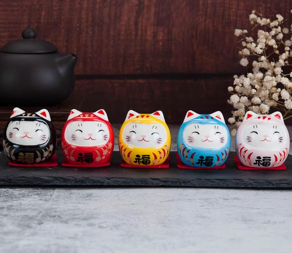 Rin Essense set of five smiling cat daruma tumbling doll ornament in black red yellow blue and white