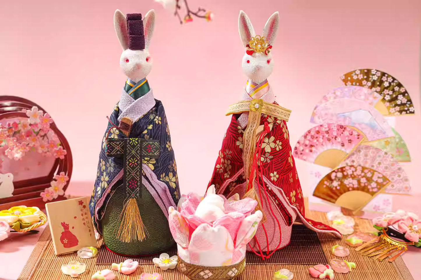 Unique Japanese home decor present featuring traditional rabbit dolls dressed in kimono with decorative fans and cherry blossom accents