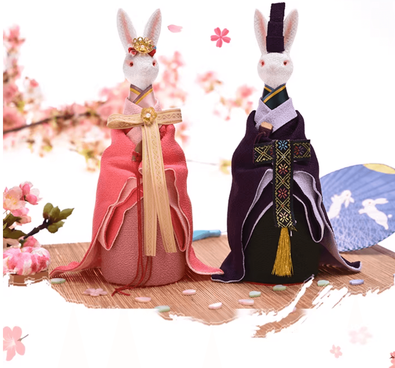 Rin Essense traditional Japanese decorative rabbit dolls in pink and purple kimonos with floral background