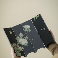 Rin Essense black lacquer table screen with painted birds peonies and bamboo held in hands