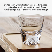 Fuji Reflection whisky glass on a wooden tray showing the full Mount Fuji base design