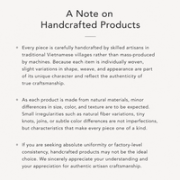 Note on handcrafted products by RIN ESSENCE explaining natural variations and authentic craftsmanship using mother of pearl nacre