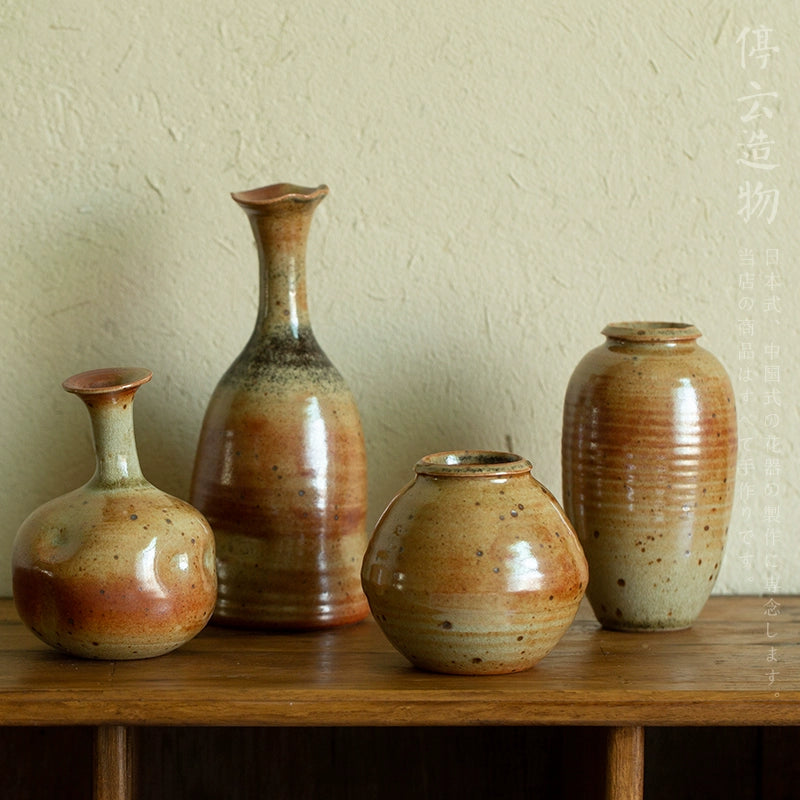 Set of four Rin Essense ceramic mini flower vase Japanese decor in earthy tones on wooden shelf