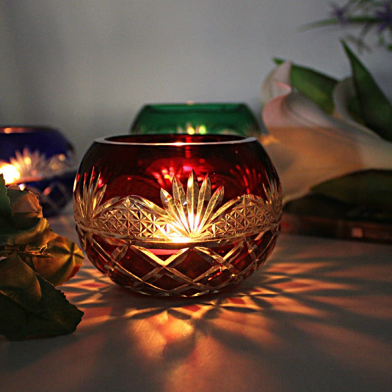 Japanese Edo Kiriko Glass Candle Holder – Round Ball Design in red with intricate cut patterns and glowing candlelight
