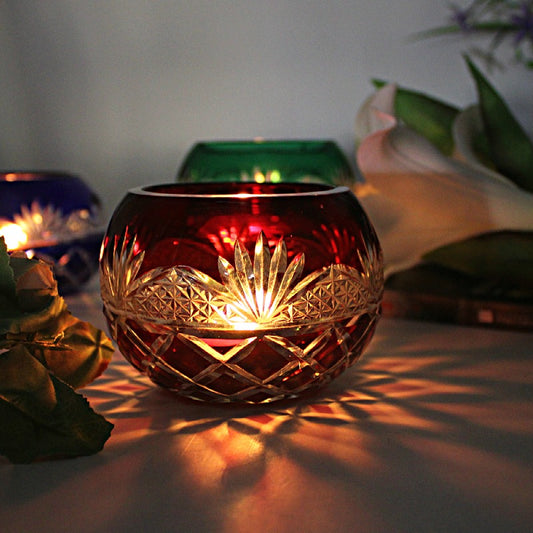 Japanese Edo Kiriko Glass Candle Holder – Round Ball Design in red with intricate cut patterns and glowing candlelight