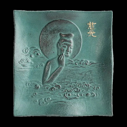 Japanese ironware plate for display home decor with embossed meditating figure and cloud patterns