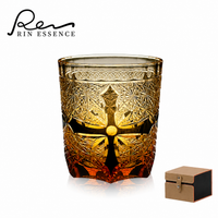 RIN ESSENCE whiskey glass with intricate star and cross pattern amber tint with storage box