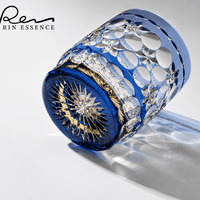 RIN ESSENCE blue and clear crystal glass whiskey with intricate cut designs and starburst base