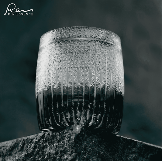 Rin Essense whiskey glass with intricate cut glass design showcasing whiskey with glass in elegant style