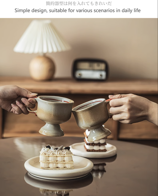 Rin Essense Japanese vintage ceramic cup pair in beige glaze on table clinking over desserts cozy home setting