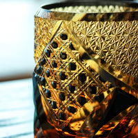 Satsuma Kiriko whiskey glass by Rin Essense amber cut crystal tumbler with intricate geometric gold pattern