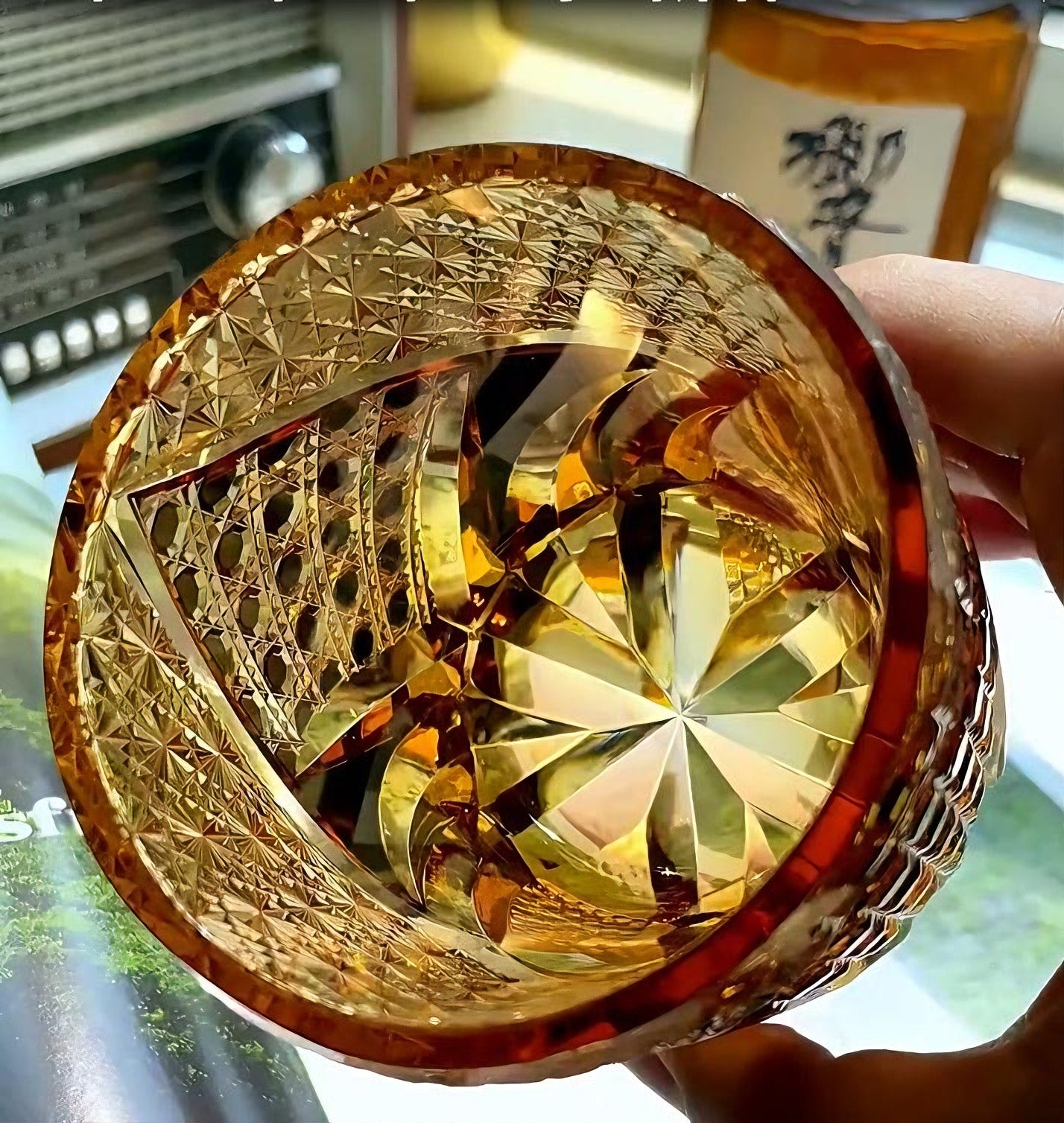 Satsuma Kiriko whiskey glass amber cut crystal with star cut base and intricate geometric patterns
