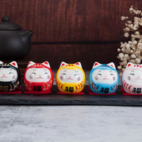 Rin Essense set of five smiling cat daruma tumbling doll ornament in black red yellow blue and white