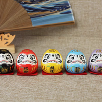 Rin Essense set of five hand painted daruma tumbling doll ornament in black red yellow blue and purple
