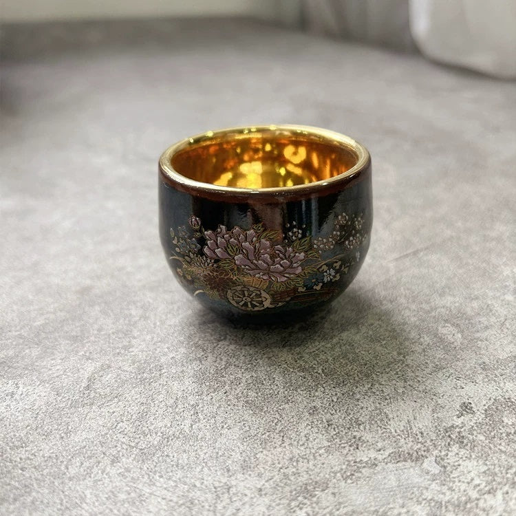 Rin Essense sake cup featuring traditional Japanese ceramic drinkware with floral design and gold interior