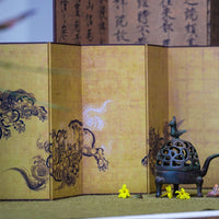 Rin Essense room divider folding screen with traditional Asian artistic design in yellow tones