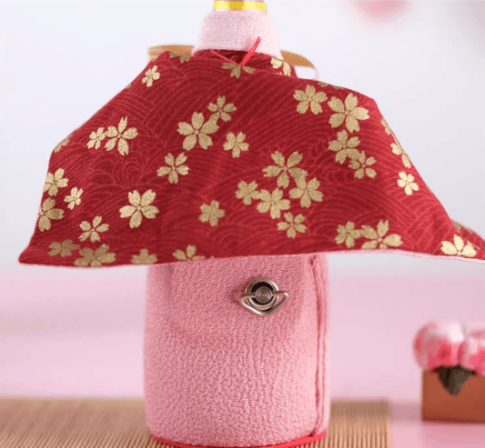 Rin Essense decorative doll wearing pink fabric and red gold floral cape unique Japanese home decor present