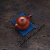 Japanese Indigo Tea Cloth – Hand-Dyed Cotton Linen with traditional teapot on rustic wooden surface