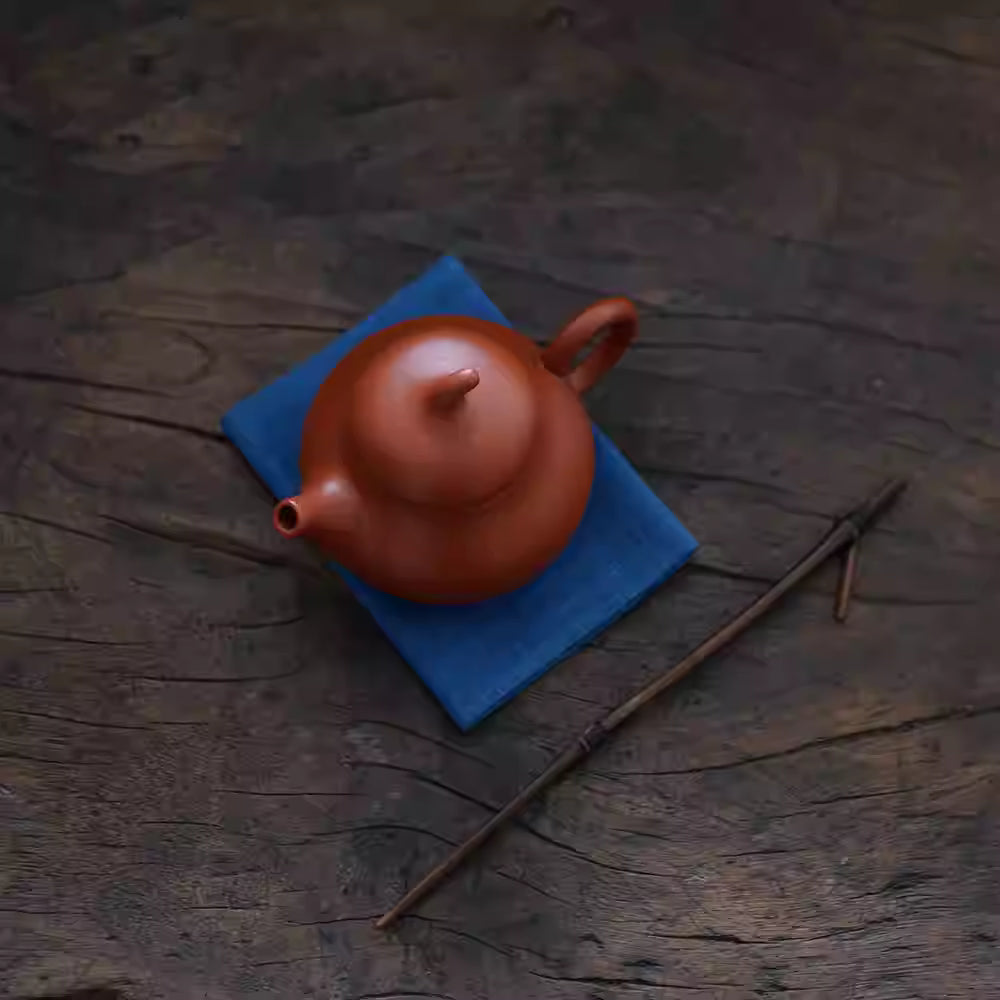 Japanese Indigo Tea Cloth – Hand-Dyed Cotton Linen with traditional teapot on rustic wooden surface