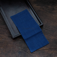 Japanese Indigo Tea Cloth – Hand-Dyed Cotton Linen in deep blue laid on dark wooden tray by Rin Essense
