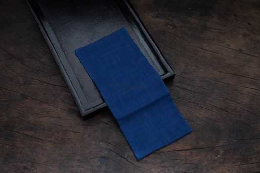 Japanese Indigo Tea Cloth – Hand-Dyed Cotton Linen in deep blue laid on dark wooden tray by Rin Essense