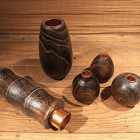 Rin Essense wood vase collection featuring dark textured wooden designs for home décor